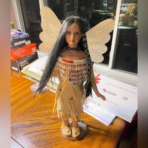 Native American-Inspired Porcelain Doll with Beaded Dress